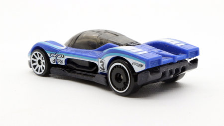Blue racing car toy isolated on white background