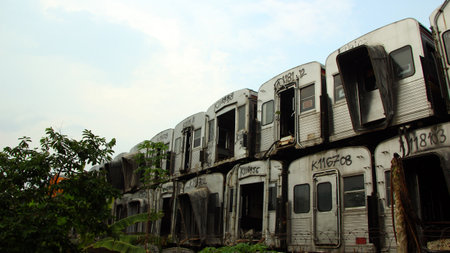Aesthetic view of a pile of unused train carriages