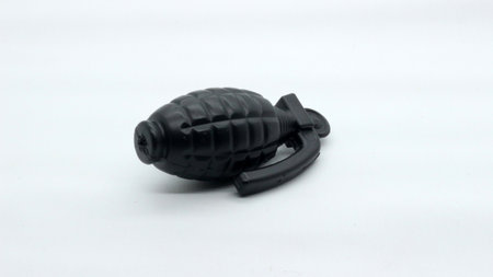 Black grenade toy isolated on white backgroundの写真素材