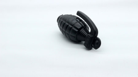 Black grenade toy isolated on white backgroundの写真素材
