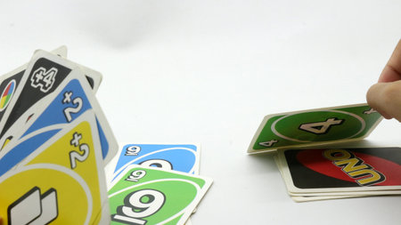 Colorful cards scattered on a white backgroundの写真素材