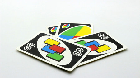 Colorful cards scattered on a white background