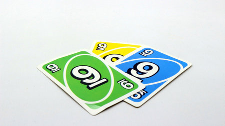 Colorful cards scattered on a white backgroundの写真素材