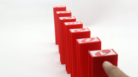 Colorful stacko blocks being played on a white backgroundの写真素材