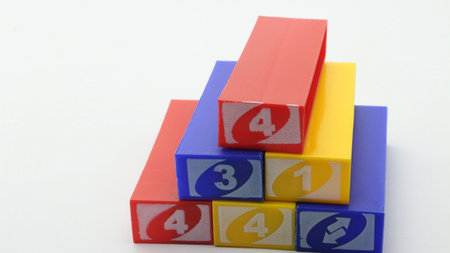 Colorful stacko blocks being played on a white backgroundの写真素材