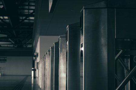 Modern passenger train turnstile at a stationの写真素材