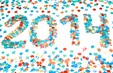 2014 carnival date in perspective with garnish made with recycled paper colorful confetti isolated whiteの写真素材