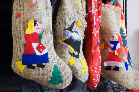 Epiphany witch socks in chimney during christmas holidaysの写真素材