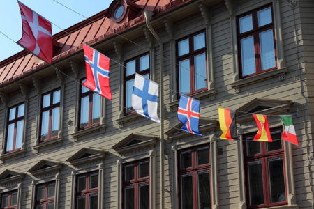 Sweden, Goteborg, Haga district, 20 May 2011 - Scandinavian and European flags across Haga Nygata street in Haga district, a popular visiting place for touristsのeditorial素材