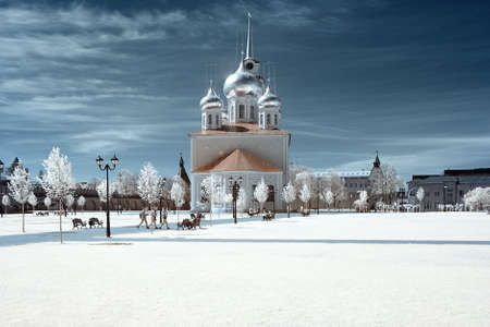 The landscape is shot on a specially installed camera, on which a filter is installed that does not allow the visible range of light to be visible. But only infrared radiation. With this shooting, the grass and foliage of the trees in white, pink or red cの写真素材