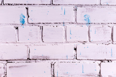 White brick wall with blue paint. Abstract background and texture for design.の写真素材