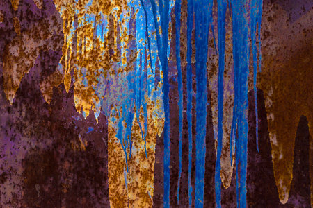 Rusty metal surface with blue paint stains. Abstract background and texture for design.の写真素材