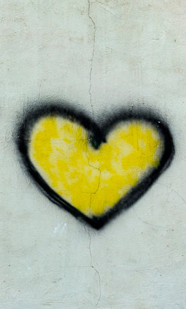 heart painted on the wall, symbol photo for love, romance and affectionの写真素材