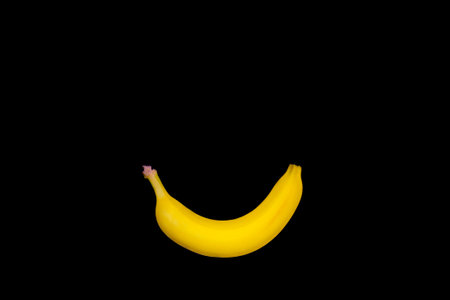 Banana isolated on black background with copy space for your text.の写真素材