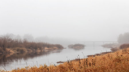 Autumn landscape. The river in the fog. Autumn landscape.の写真素材