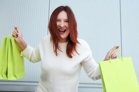 Masked woman due to air pollution or viral epidemic in the cityの写真素材