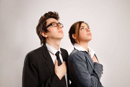 Two business partners looking up