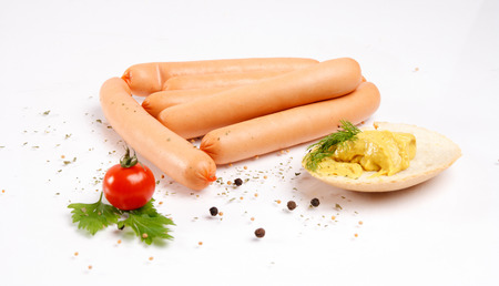 Sausages with bread, mustard and spicesの写真素材