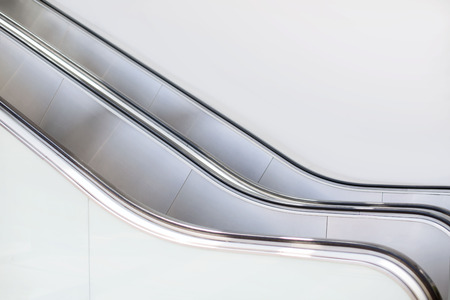 escalator shopping mall in wide angle without people high key white colorの写真素材