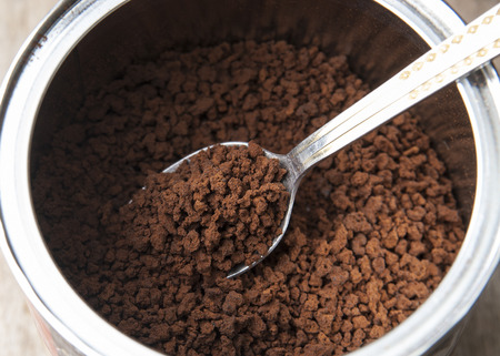 Fresh ground coffee in canの写真素材