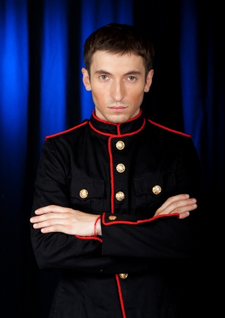 Portrait of the young beautiful man  in studioの写真素材