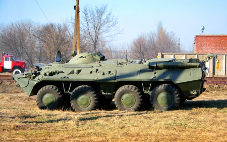 An old Soviet Armored troop-carrier on the street