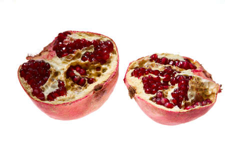 Ripe pomegranate fruit isolated on white background cutout