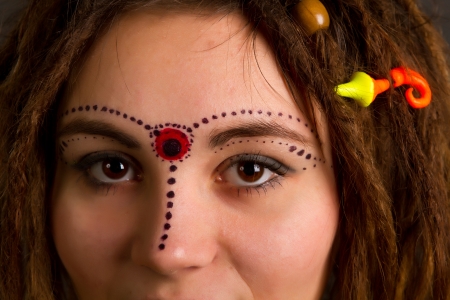 portrait of a beautiful young girl with dreadlocks shot in studioの写真素材
