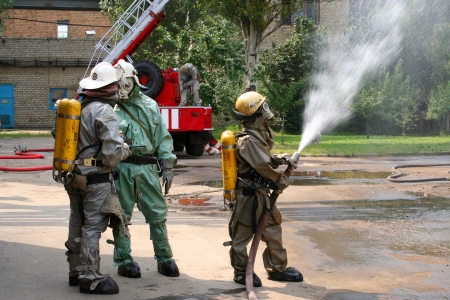 firefighters in chemical protection suit during the jobのeditorial素材