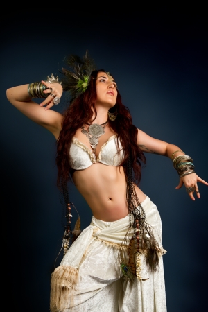 Young attractive retro model in old-fashioned wild clothing dancingの写真素材