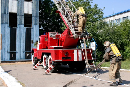 fireman wearing a gas mask on the stairs