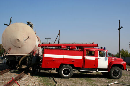 firefighters in chemical protection suit during the job