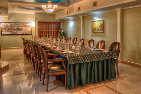 decorated table for a celebration or a romantic dinner in a restaurantのeditorial素材