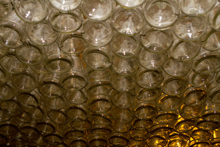 Bottom of bottles Background Made From Empty Beer Bottlesの写真素材