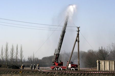 fireman wearing a gas mask on the stairsの写真素材