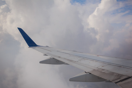 airplane wing sky panorama environment clouds scenic weather earth