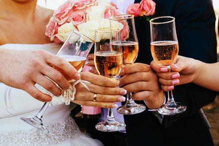 Tray of colorful glasses filled with Champagne celebrationの写真素材