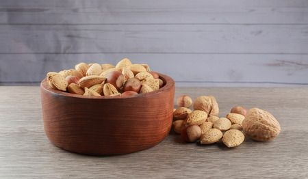 Assorted mixed nuts on white background almond hazelnut walnut