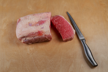 Fresh raw beef steak isolated on white slice beefsteakの写真素材