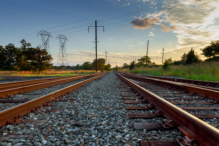 Cargo train platform at sunset. Railroad in Ukraine. Railway station.の写真素材