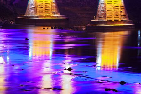 colorful lighting reflection in water water reflection night lights river