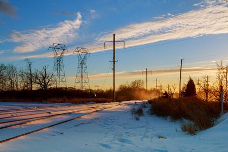 Night sky clouds sunset power lines winterの写真素材