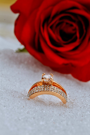 Wedding rings in Snow anniversary, beautiful, bridal, bride celebration ceremonyの写真素材