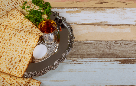 top view of passover background. matzoh jewish holiday bread and traditional sedder plate