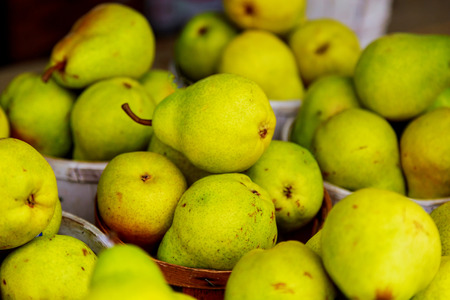 selling pears in baskets at the farmer's market Fruits for sale at farmer's marketの写真素材