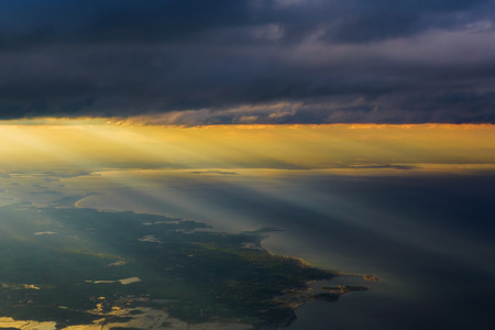 Clouds Ocean view from airplane sky clouds airplane flight altitude sunsetの写真素材