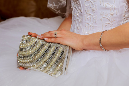 Bride's hands closeup at wedding.The waits for groom Beautiful bride's hands in wedding day.の写真素材