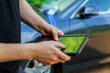 Young businessman working with modern devices, digital tabletの写真素材