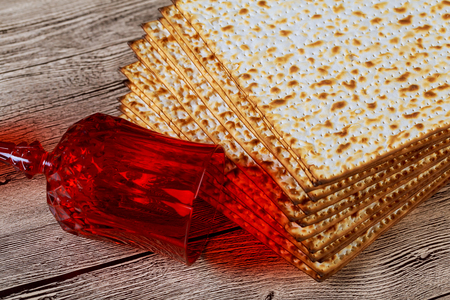 traditional Jewish kosher matzo for Passover macro on a wooden table.の写真素材