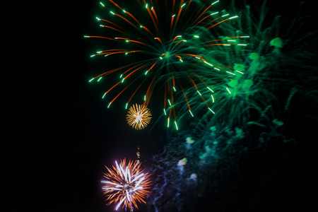 Amazing celebration multicolored sparkling fireworks. 4th of July beautiful fireworks. Independence Day, Canada Day, New Year holidays salute.の写真素材